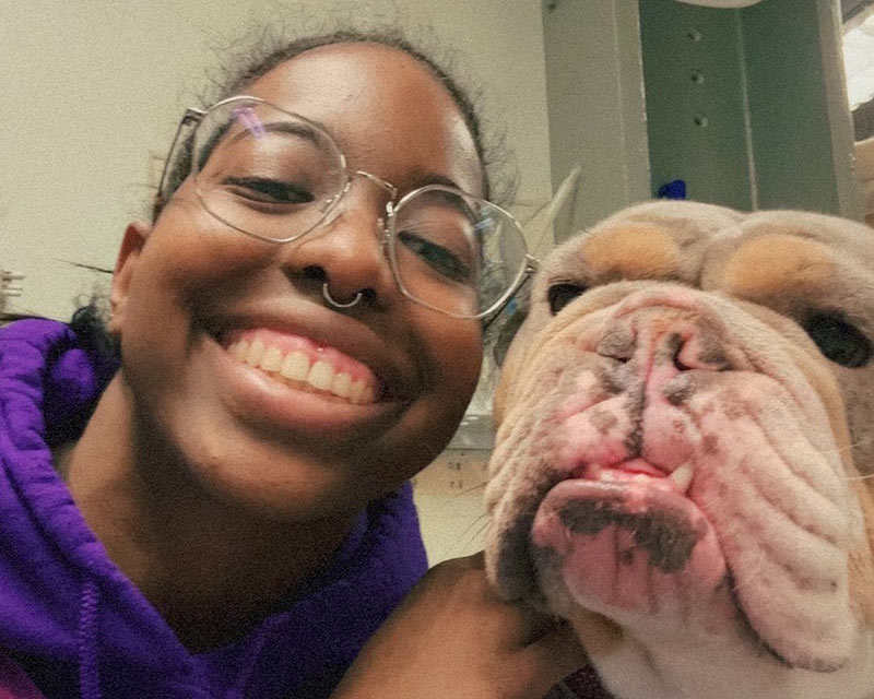 closeup-of-happy-veterinary-team-member-with-dog-800x640-1 dog food in lab